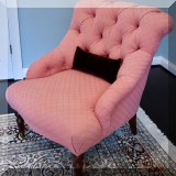 F33. Pair of Tufted pink chairs on casters. 36”h x 30”w x 32”d - $275 each